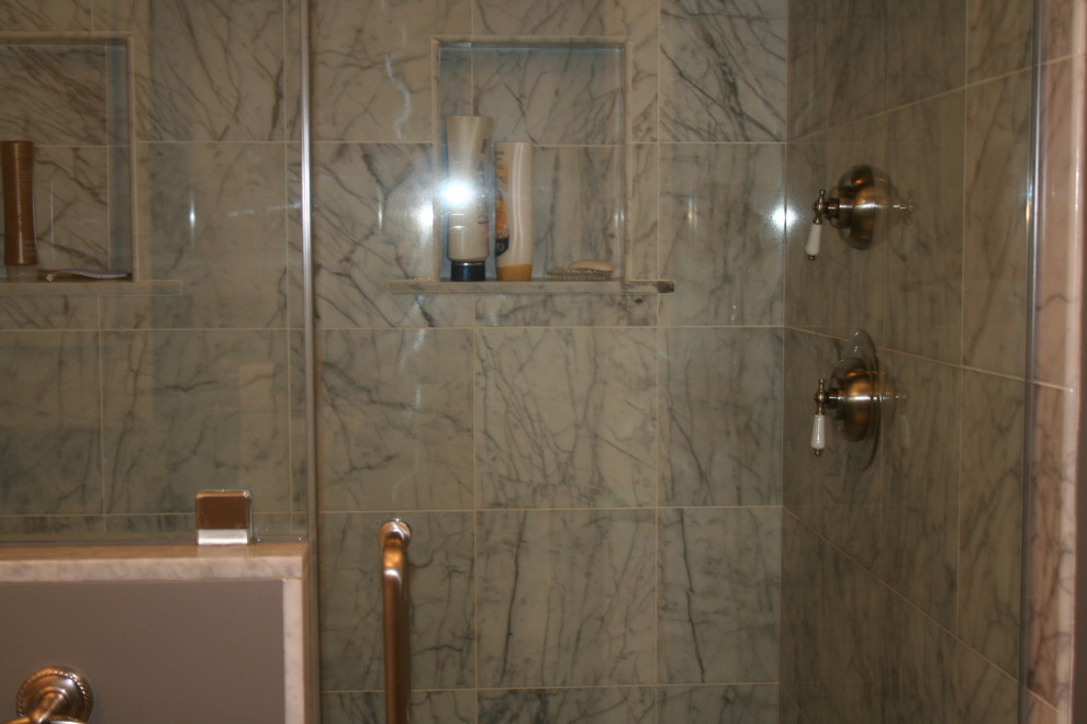Example of a large classic master gray tile and porcelain tile marble floor alcove shower design in Providence with shaker cabinets, white cabinets, marble countertops, a two-piece toilet, an undermount sink and gray walls