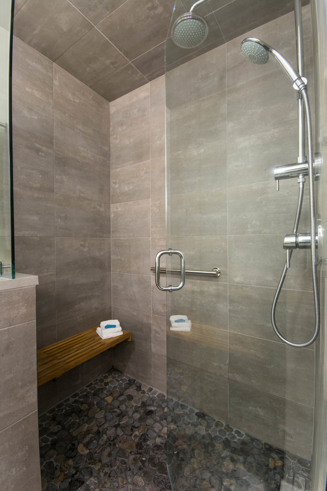 This is an example of a medium sized modern shower room bathroom in Providence with flat-panel cabinets, dark wood cabinets, an alcove shower, a one-piece toilet, grey tiles, cement tiles, white walls, slate flooring, an integrated sink, engineered stone worktops, grey floors, a hinged door and white worktops.