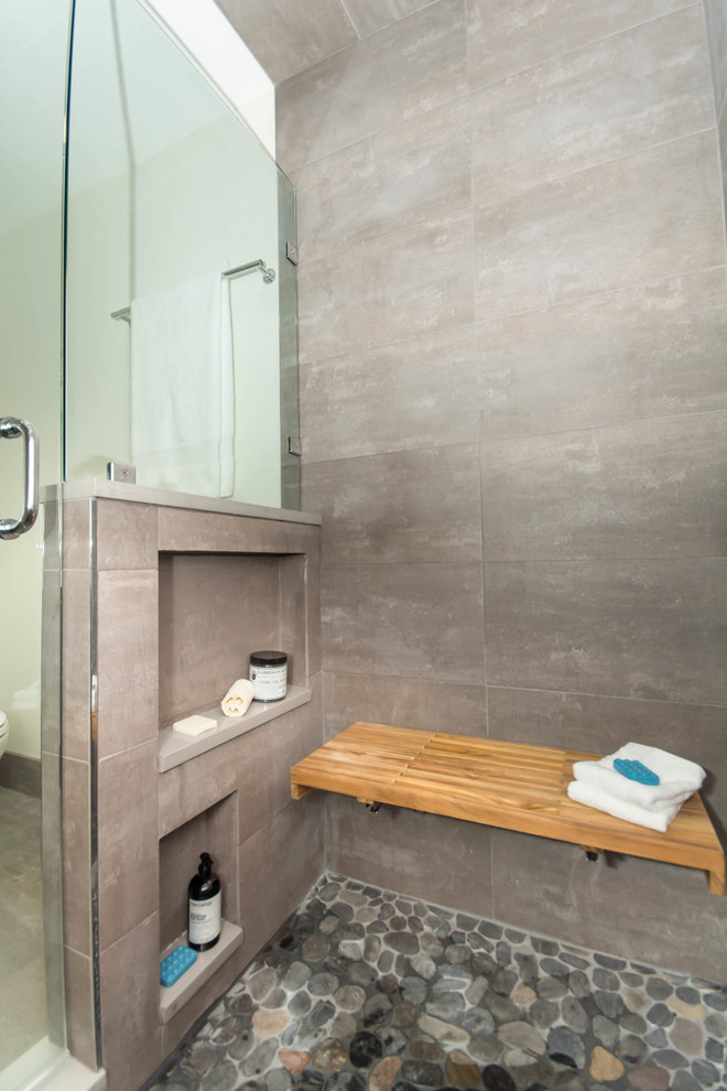 Medium sized modern shower room bathroom in Providence with flat-panel cabinets, dark wood cabinets, an alcove shower, a one-piece toilet, grey tiles, cement tiles, white walls, slate flooring, an integrated sink, engineered stone worktops, grey floors, a hinged door and white worktops.