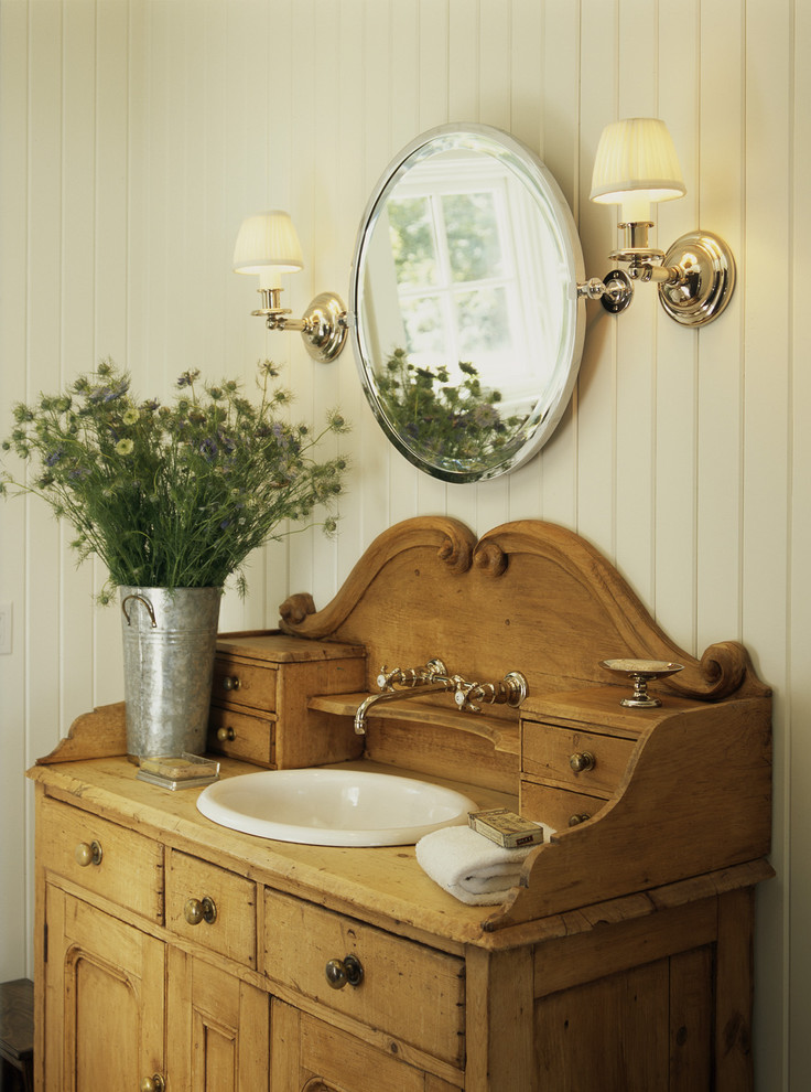 Inspiration for a coastal bathroom remodel in DC Metro with a drop-in sink