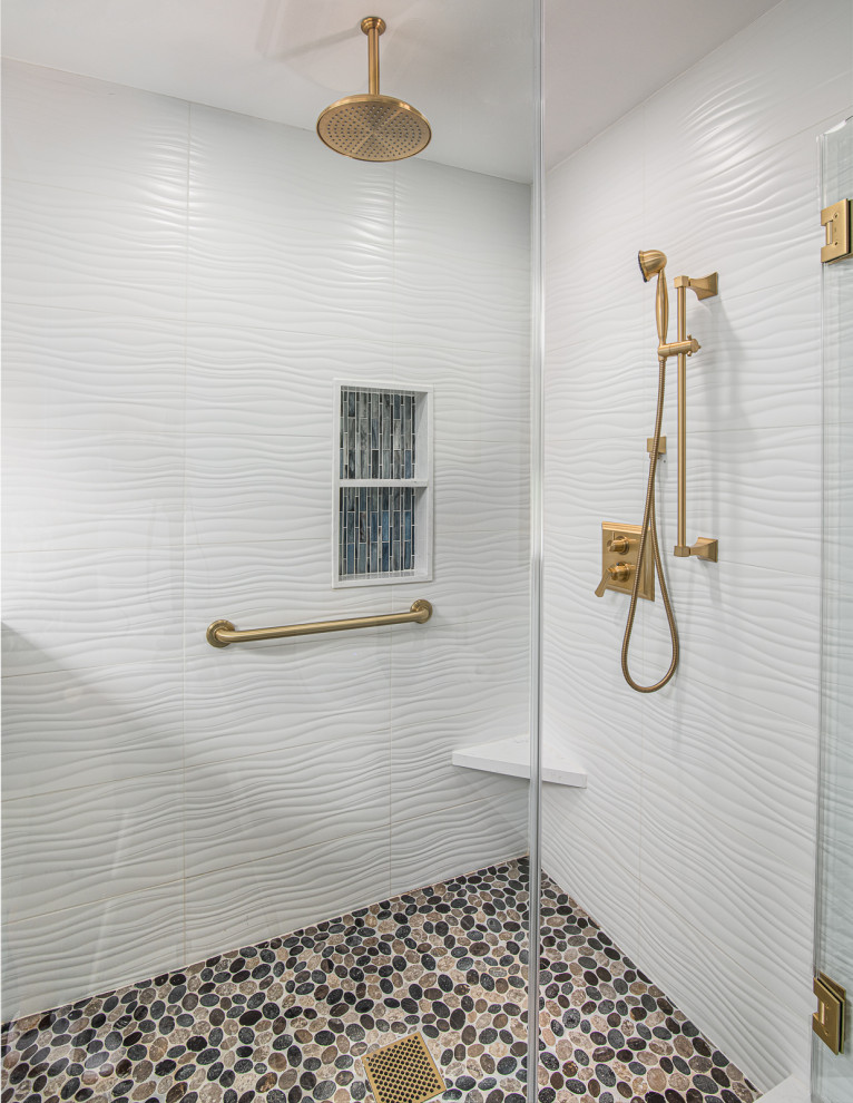 Bathroom - mid-sized transitional master white tile and porcelain tile medium tone wood floor and multicolored floor bathroom idea in Los Angeles with glass-front cabinets, dark wood cabinets, blue walls, an undermount sink, quartz countertops, a hinged shower door and white countertops