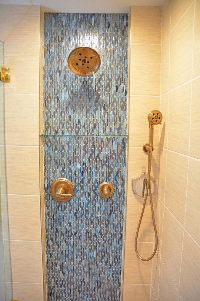 Doorless shower - mid-sized eclectic master multicolored tile and ceramic tile ceramic tile and brown floor doorless shower idea in Other with recessed-panel cabinets, blue cabinets, a two-piece toilet, white walls, an undermount sink, quartz countertops, a hinged shower door and white countertops
