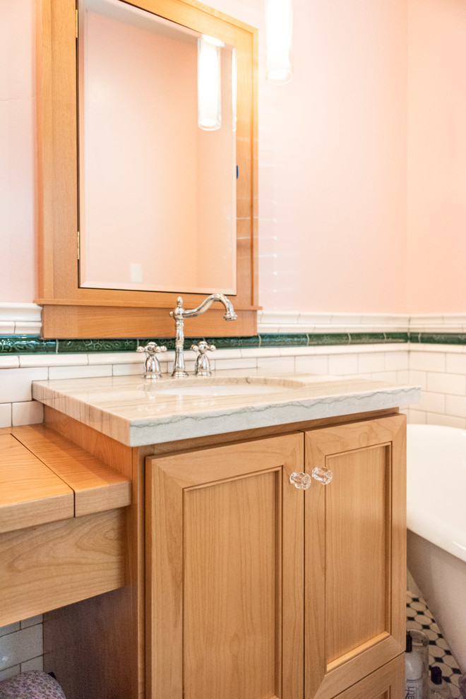 Small eclectic master white tile and subway tile porcelain tile and multicolored floor claw-foot bathtub photo in San Luis Obispo with recessed-panel cabinets, medium tone wood cabinets, pink walls, an integrated sink and multicolored countertops