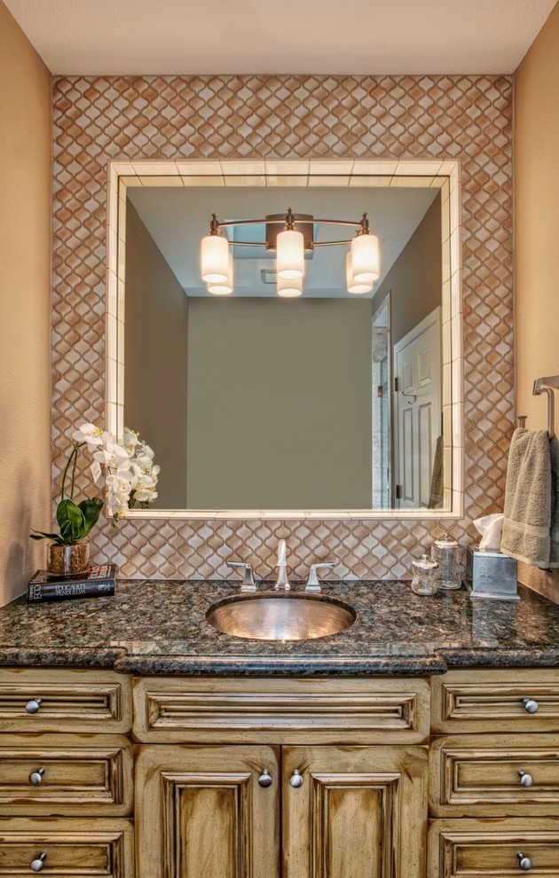 Large elegant 3/4 bathroom photo in Phoenix with recessed-panel cabinets, light wood cabinets, beige walls, an undermount sink and granite countertops