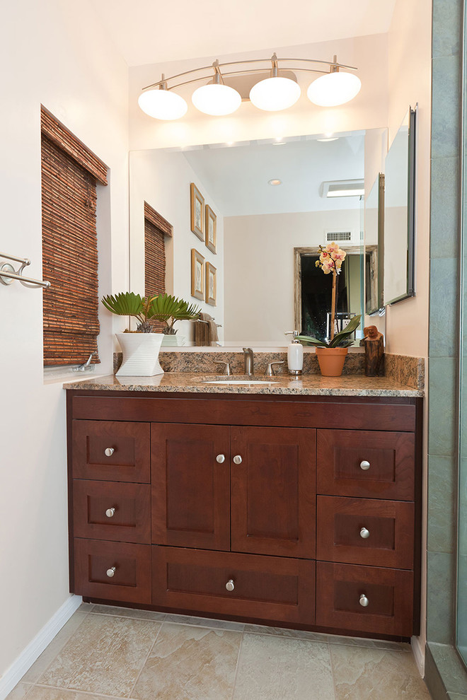 Photo of a small bohemian shower room bathroom in Los Angeles with a submerged sink, shaker cabinets, dark wood cabinets, granite worktops and beige tiles.