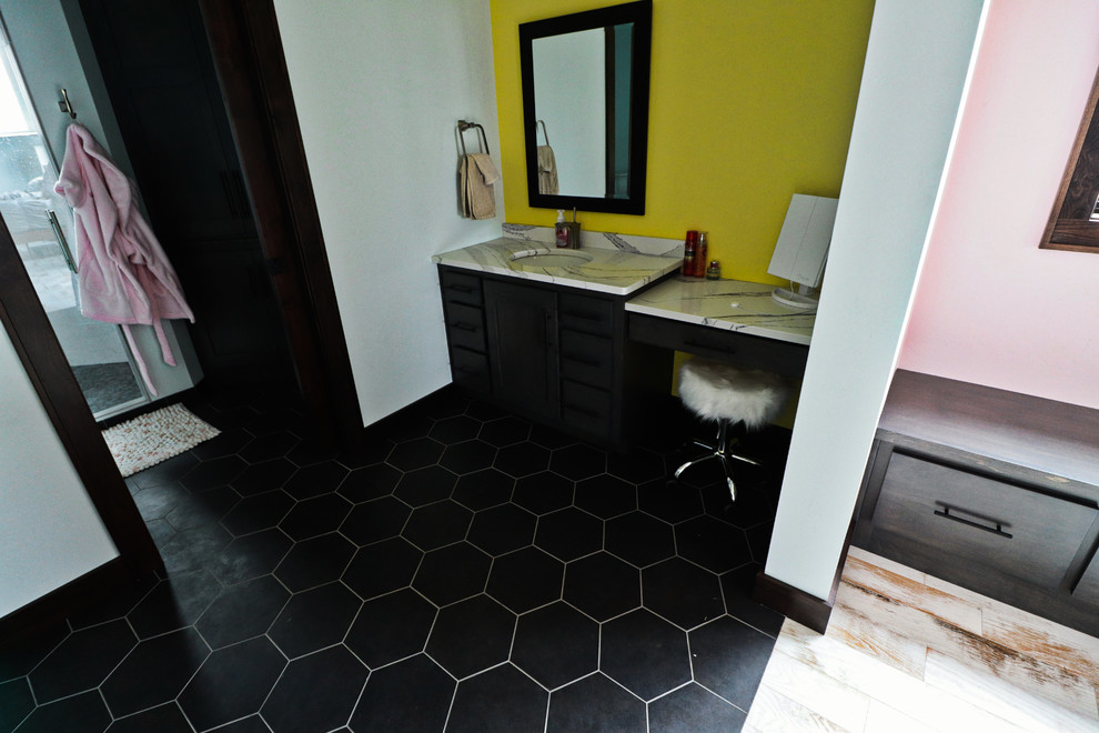 Example of a large eclectic kids' white tile and porcelain tile porcelain tile and black floor corner shower design in Other with flat-panel cabinets, dark wood cabinets, yellow walls, an undermount sink, quartz countertops, a hinged shower door and white countertops