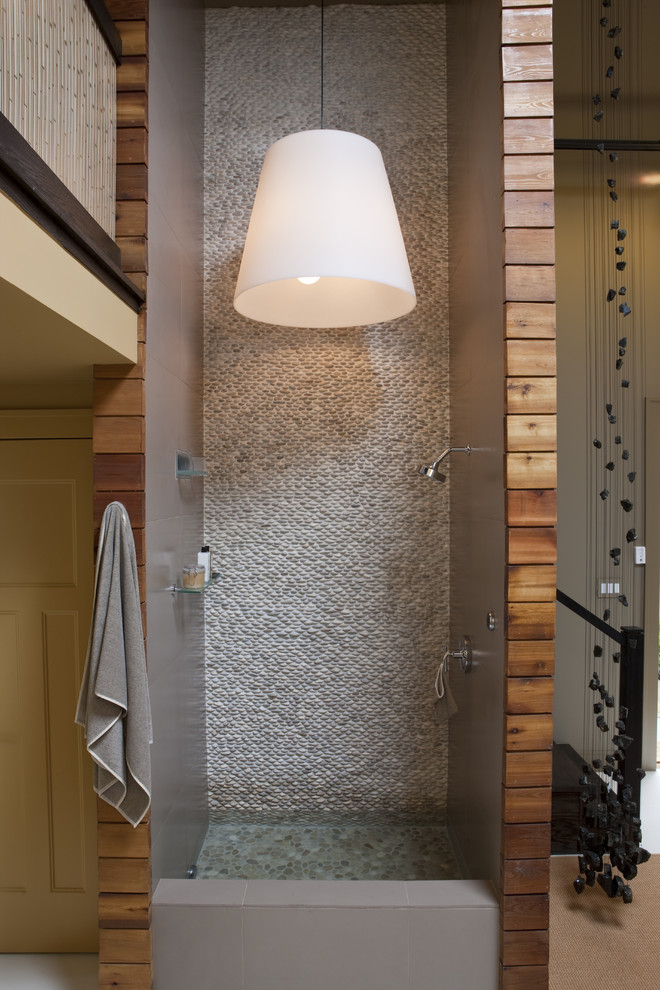 Contemporary bathroom in DC Metro with a walk-in shower, grey tiles, pebble tiles, pebble tile flooring and an open shower.