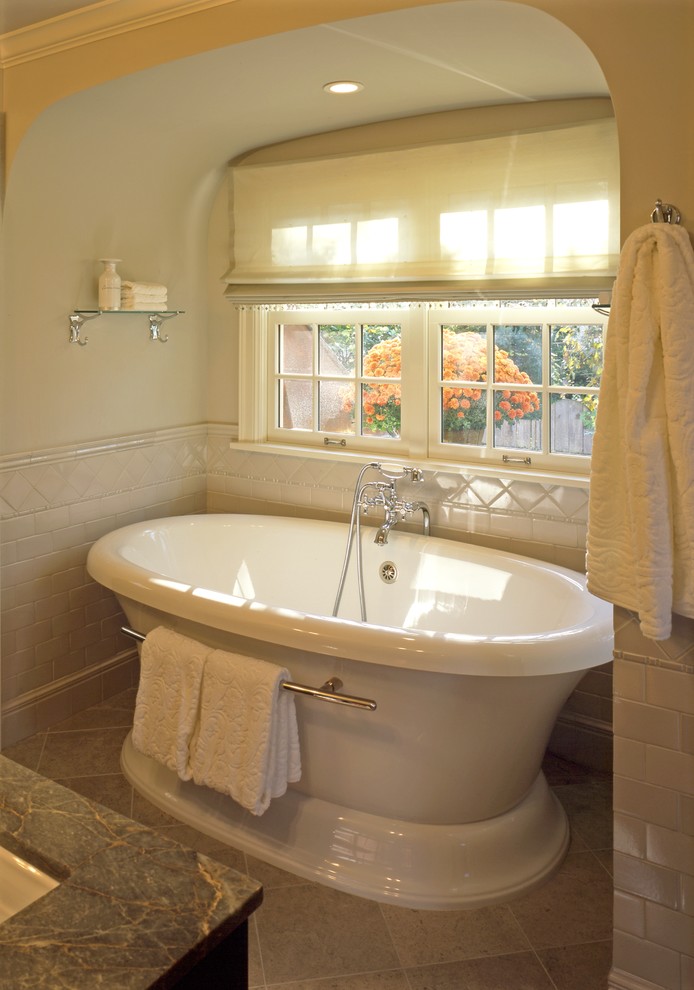 Mid-sized transitional master beige tile and ceramic tile ceramic tile bathroom photo in Minneapolis with an undermount sink, flat-panel cabinets, dark wood cabinets, granite countertops, a two-piece toilet and beige walls