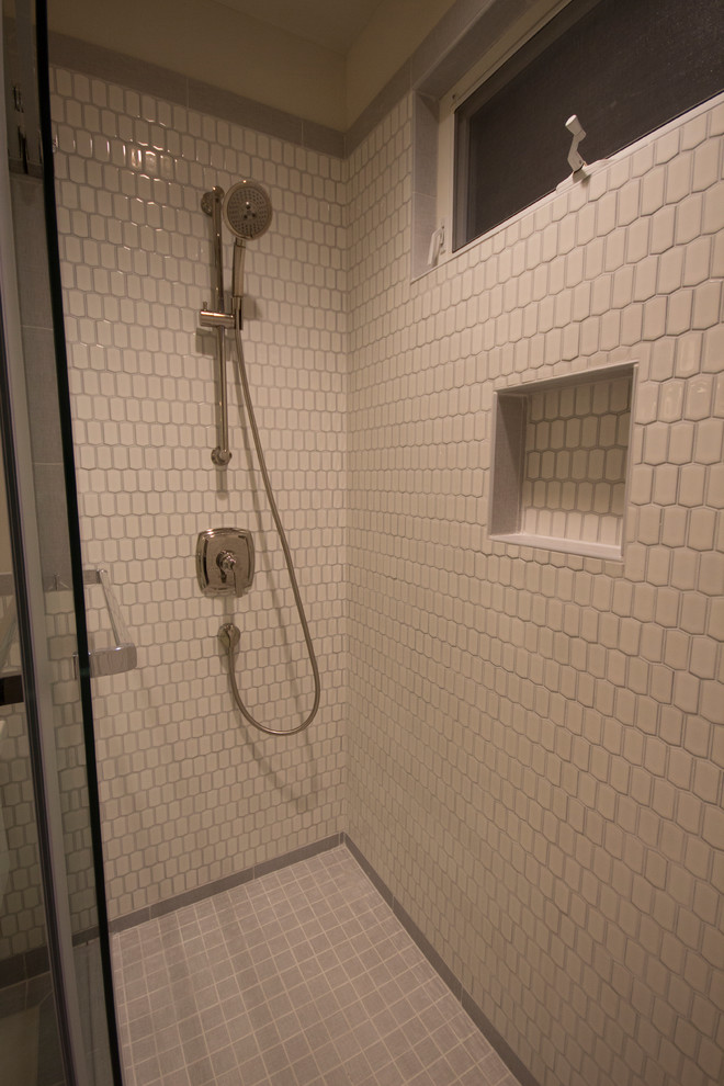 Inspiration for a small timeless 3/4 white tile and ceramic tile ceramic tile alcove shower remodel in Seattle with a one-piece toilet, beige walls, a console sink and marble countertops