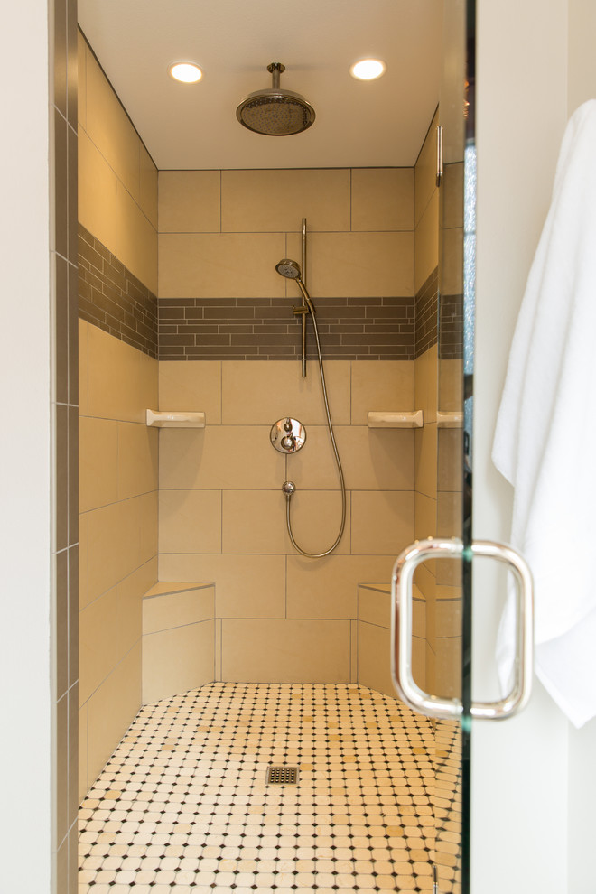 Example of a mid-sized classic master beige tile and porcelain tile alcove shower design in Seattle with recessed-panel cabinets, medium tone wood cabinets, a one-piece toilet, white walls and an undermount sink