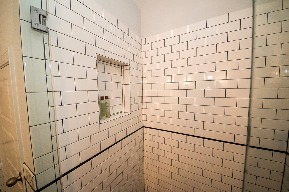Photo of a medium sized eclectic ensuite bathroom in St Louis with a corner shower, a two-piece toilet, white tiles, ceramic tiles, grey walls, ceramic flooring, a pedestal sink, grey floors and a hinged door.
