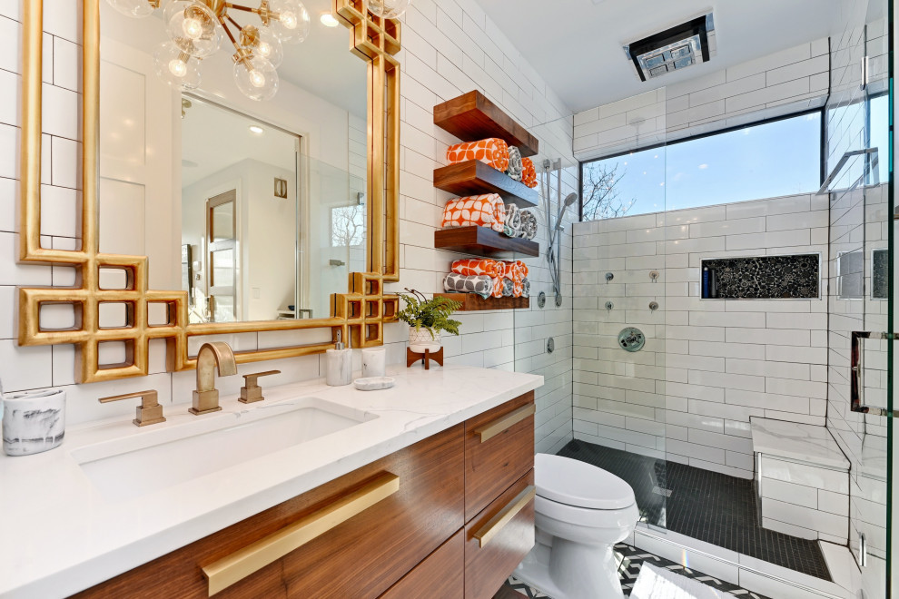 Exemple d'une douche en alcôve tendance en bois brun avec un placard à porte plane, un carrelage blanc, un lavabo encastré, un sol multicolore, un plan de toilette blanc et du carrelage bicolore.