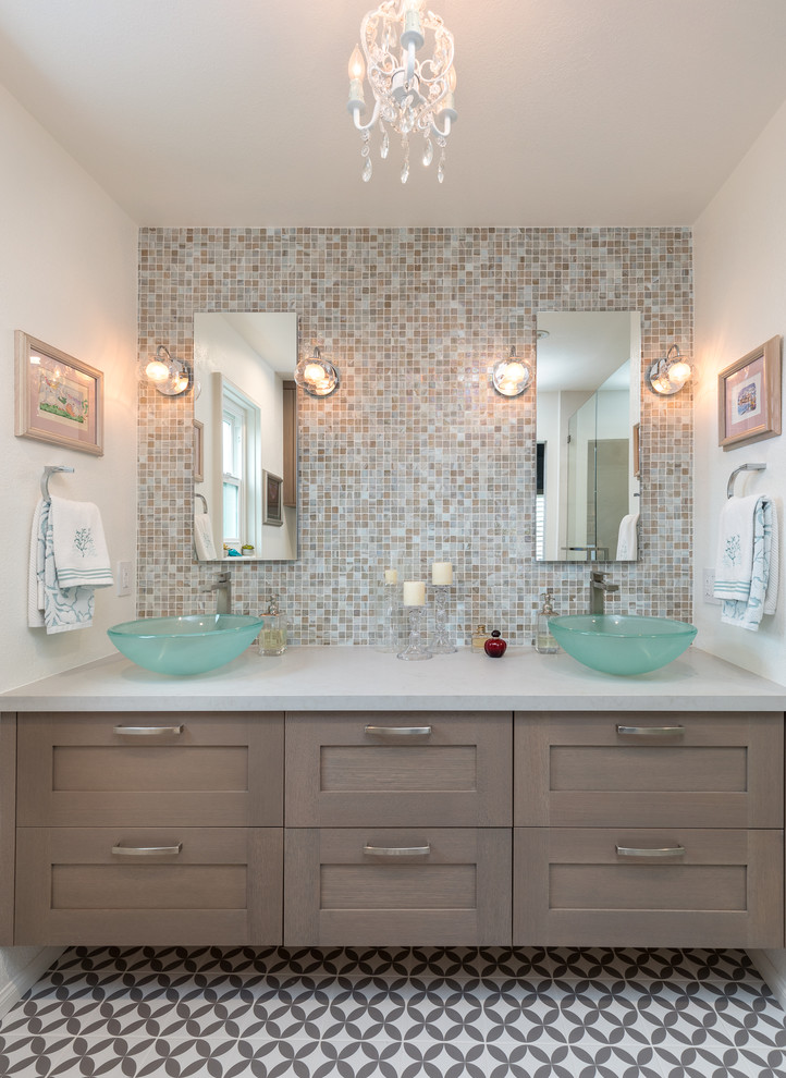 Inspiration for a coastal master mosaic tile porcelain tile bathroom remodel in Los Angeles with shaker cabinets and a vessel sink