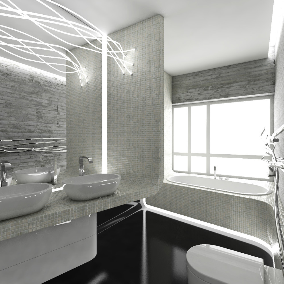 Réalisation d'une salle de bain principale minimaliste de taille moyenne avec des portes de placard blanches, une baignoire posée, une douche ouverte, WC suspendus, un carrelage gris, un mur gris, une vasque, un plan de toilette en carrelage, un sol noir et aucune cabine.