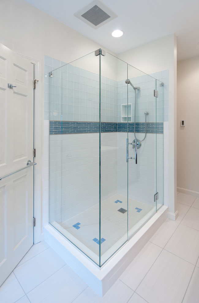 Bathroom - mid-sized contemporary master blue tile and matchstick tile ceramic tile bathroom idea in Providence with flat-panel cabinets, dark wood cabinets, gray walls, an undermount sink and quartz countertops