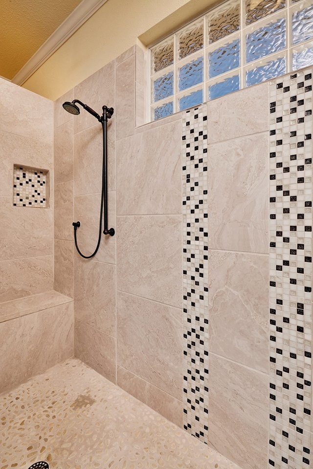 Inspiration for an expansive traditional ensuite bathroom in Houston with porcelain flooring, shaker cabinets, dark wood cabinets, an alcove shower, a one-piece toilet, white tiles, porcelain tiles, yellow walls, a submerged sink and marble worktops.