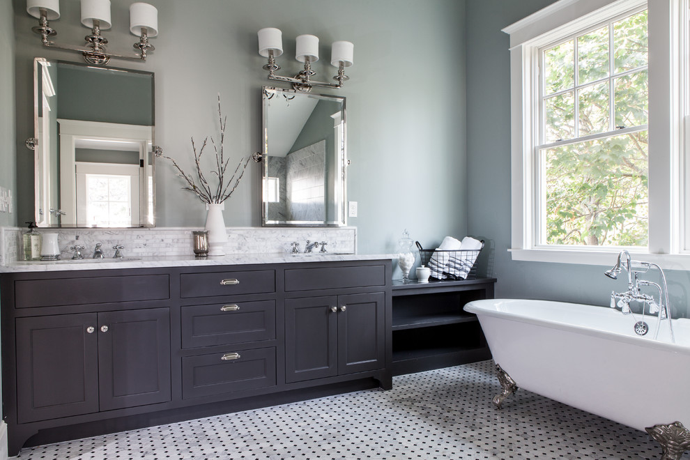 Inspiration for a timeless claw-foot bathtub remodel in Portland with gray countertops