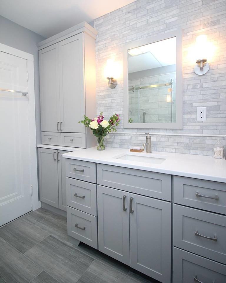 Small transitional master gray tile and mosaic tile ceramic tile doorless shower photo in Boston with shaker cabinets, gray cabinets, a two-piece toilet, gray walls, an undermount sink and quartz countertops