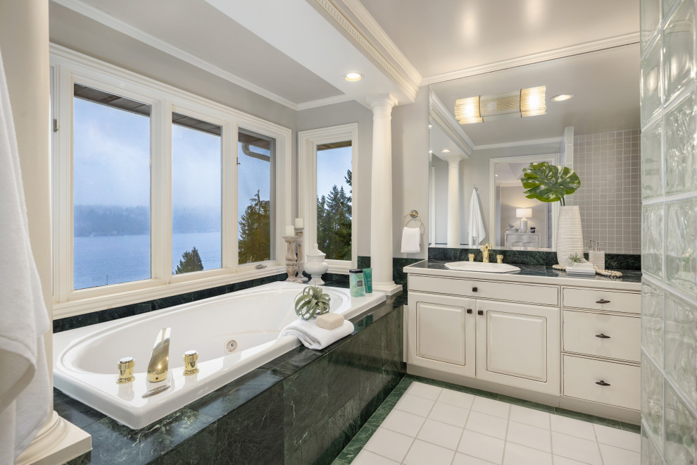 Inspiration for a large transitional master multicolored floor and double-sink bathroom remodel in Seattle with a built-in vanity