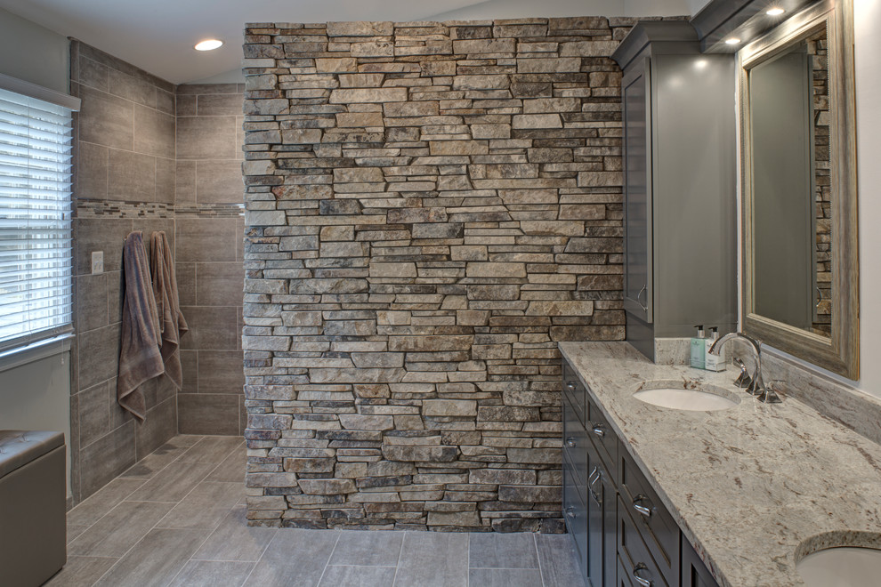 Large minimalist master beige tile and stone tile porcelain tile walk-in shower photo in Baltimore with shaker cabinets, gray cabinets, white walls, an undermount sink and granite countertops