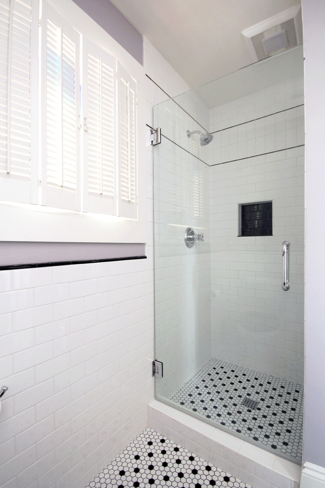 Traditional bathroom in Raleigh with an alcove shower, black and white tiles, metro tiles, purple walls and porcelain flooring.