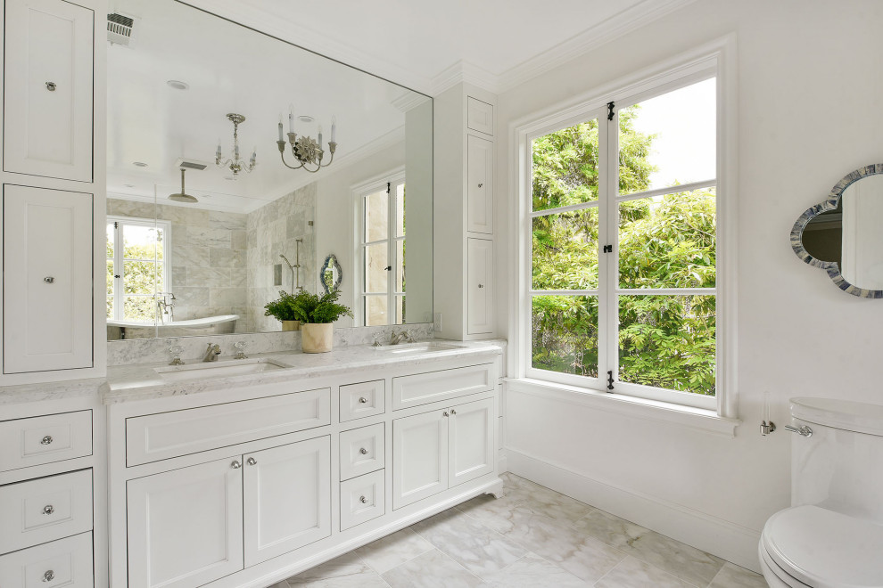 Design ideas for a medium sized mediterranean shower room bathroom in San Francisco with shaker cabinets, white cabinets, a one-piece toilet, white walls, porcelain flooring, a submerged sink, grey floors, grey worktops, double sinks and a built in vanity unit.