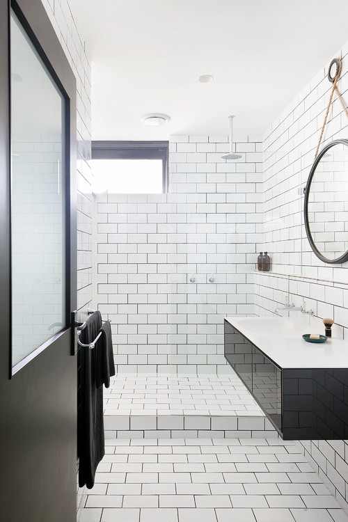 Transitional Bathroom with White Subway Tiles and Black Grout