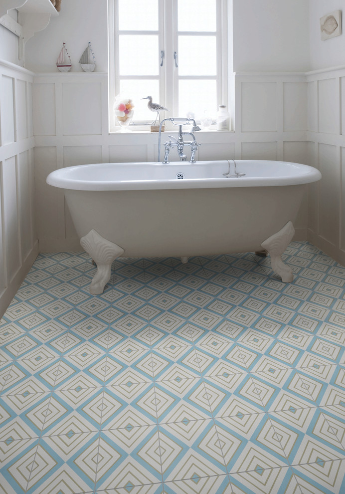 This is an example of a nautical bathroom in Wiltshire with cement tiles.