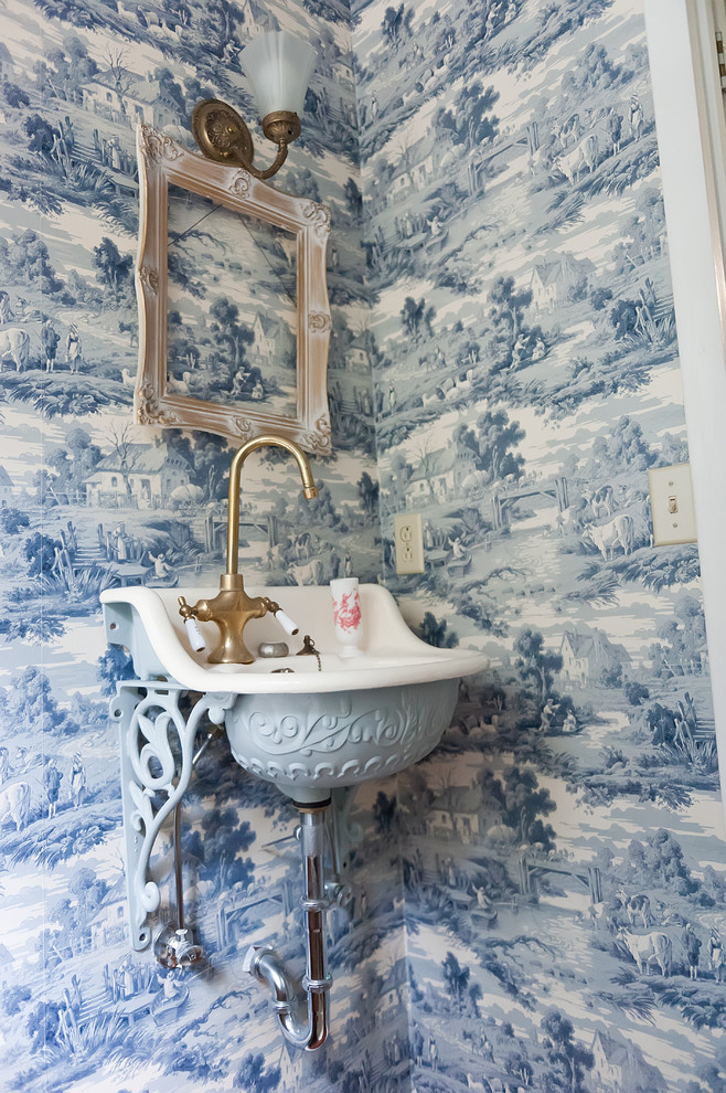Example of an ornate bathroom design in Nashville with a wall-mount sink