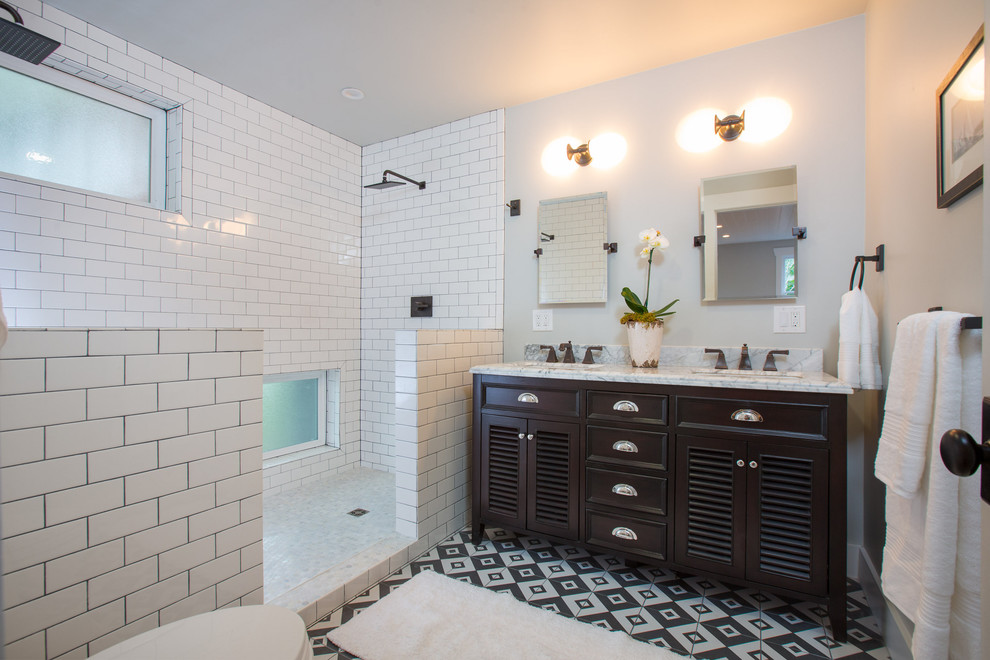 Inspiration for a huge eclectic master white tile and subway tile porcelain tile double shower remodel in San Francisco with an integrated sink, louvered cabinets, dark wood cabinets, marble countertops, a wall-mount toilet and gray walls