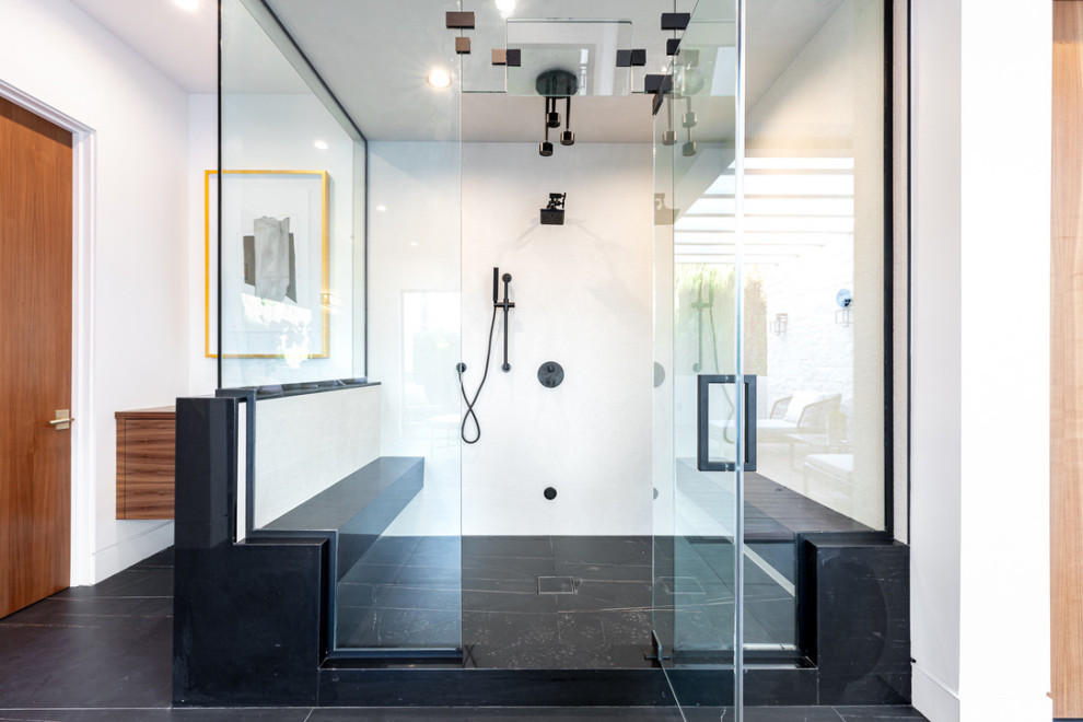 Bathroom - huge contemporary master slate floor, black floor, double-sink and exposed beam bathroom idea in Los Angeles with flat-panel cabinets, dark wood cabinets, white walls, an undermount sink, quartz countertops, a hinged shower door, black countertops, a niche and a floating vanity
