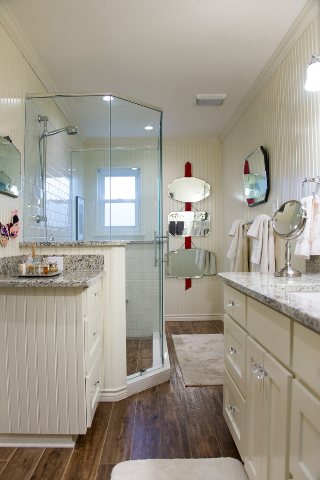 Classic bathroom in Austin with a submerged sink, recessed-panel cabinets, white cabinets, granite worktops, a one-piece toilet, white tiles, ceramic flooring and beige walls.