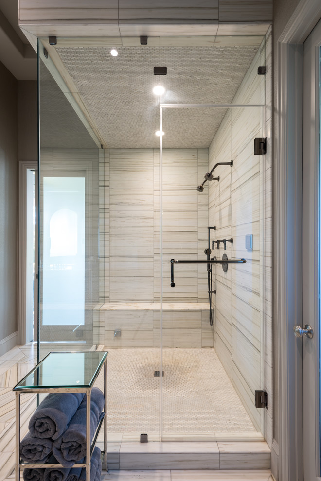 Large contemporary sauna bathroom in Dallas with flat-panel cabinets, dark wood cabinets, a freestanding bath, beige tiles, porcelain tiles, beige walls, marble flooring, a submerged sink and marble worktops.