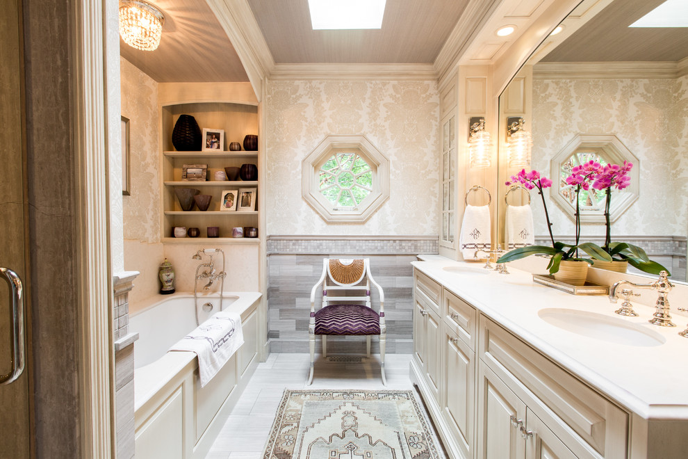 Design ideas for a classic ensuite bathroom in Baltimore with a submerged sink, beaded cabinets, beige cabinets, an alcove bath, beige tiles and beige walls.
