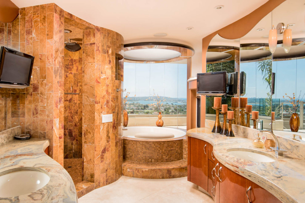 Example of a mid-sized trendy master ceramic tile and brown tile beige floor bathroom design in San Diego with a hot tub, orange walls, granite countertops, beige countertops, flat-panel cabinets and an undermount sink