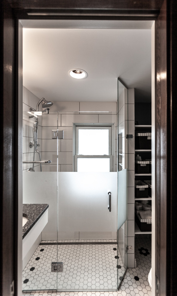 Design ideas for a scandinavian bathroom in Minneapolis with shaker cabinets and white cabinets.