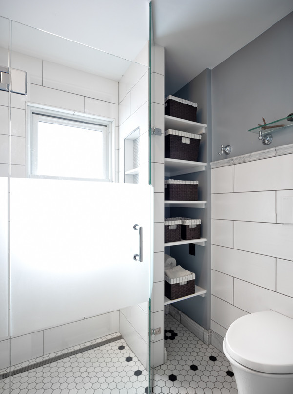 This is an example of a scandinavian bathroom in Minneapolis with shaker cabinets and white cabinets.