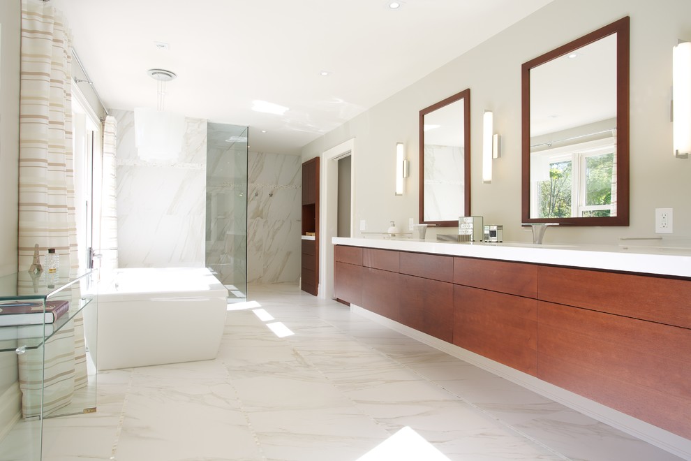 Large trendy master white tile bathroom photo in Toronto with an undermount sink, flat-panel cabinets, medium tone wood cabinets, a one-piece toilet and white walls