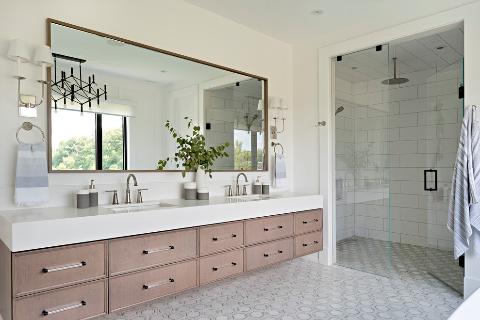 Inspiration for a transitional master white tile multicolored floor and double-sink alcove shower remodel in Toronto with recessed-panel cabinets, a floating vanity, brown cabinets, white walls, an undermount sink, a hinged shower door and white countertops