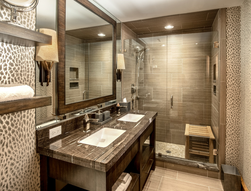 Photo of a rustic shower room bathroom in Charlotte with dark wood cabinets, an alcove shower, grey tiles, grey walls, a submerged sink, grey floors, a hinged door, grey worktops and open cabinets.