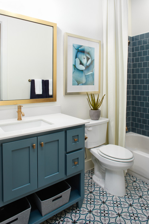 Blue Vanity Bliss: Elevate Your Bathroom with Blue-Green Subway Tiles and Gold Accents