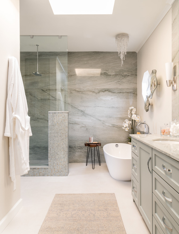 Inspiration for a medium sized traditional ensuite bathroom in Dallas with shaker cabinets, green cabinets, a freestanding bath, a built-in shower, a bidet, green tiles, mosaic tiles, beige walls, porcelain flooring, a submerged sink, quartz worktops, beige floors, an open shower and green worktops.