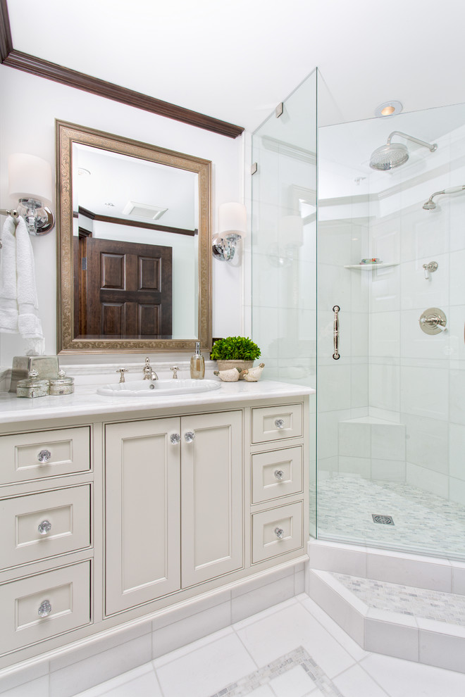 Example of a classic bathroom design in Vancouver with a drop-in sink