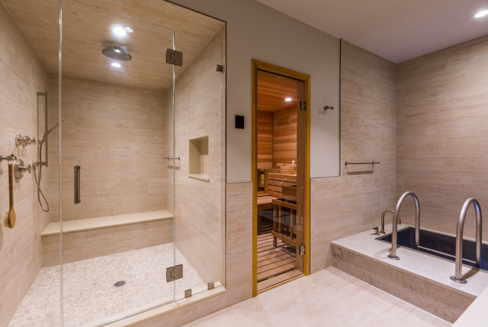Стильный дизайн: большая баня и сауна в стиле неоклассика (современная классика) с светлыми деревянными фасадами, японской ванной, душем в нише, инсталляцией, бежевой плиткой, керамогранитной плиткой, бежевыми стенами, полом из керамогранита, врезной раковиной, столешницей из кварцита, бежевым полом, душем с распашными дверями, белой столешницей, сиденьем для душа, тумбой под две раковины и напольной тумбой - последний тренд