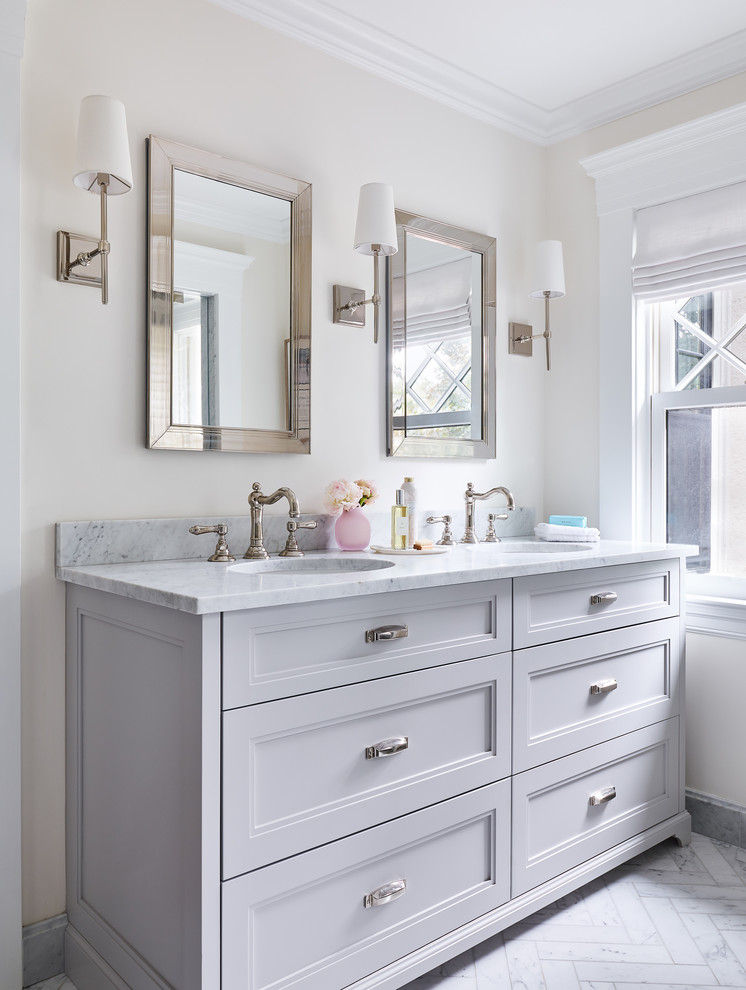 Inspiration for a large classic ensuite bathroom in Boston with shaker cabinets, grey cabinets, a double shower, a one-piece toilet, white tiles, marble tiles, white walls, marble flooring, a submerged sink, marble worktops, white floors, a hinged door and white worktops.