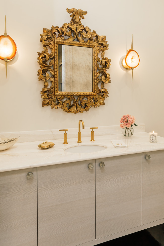 Design ideas for a large contemporary ensuite bathroom in New Orleans with flat-panel cabinets, white walls, a submerged sink, beige cabinets, a freestanding bath, a corner shower, marble tiles, marble flooring, marble worktops, white floors, a hinged door and white worktops.