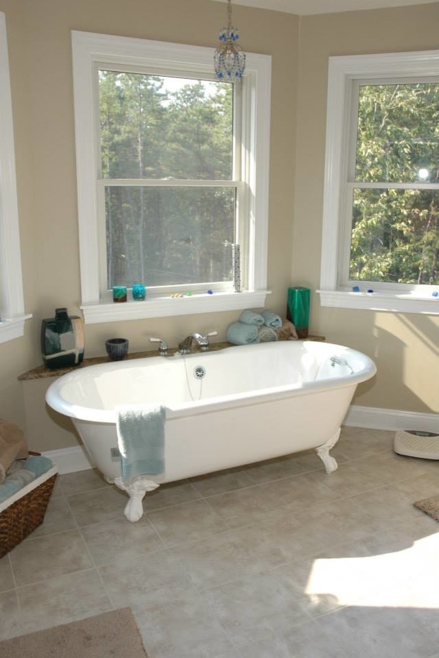 Freestanding bathtub - mid-sized shabby-chic style master ceramic tile freestanding bathtub idea in Philadelphia with beige walls