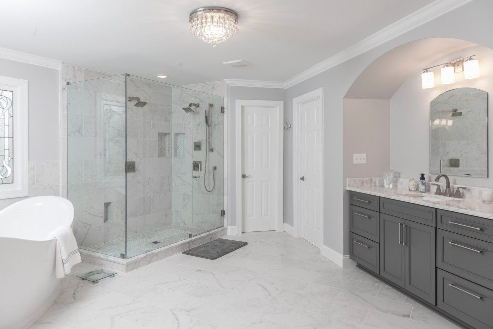 Bathroom - huge contemporary master white tile and porcelain tile marble floor and white floor bathroom idea in Atlanta with shaker cabinets, gray cabinets, a two-piece toilet, gray walls, an undermount sink, marble countertops and white countertops