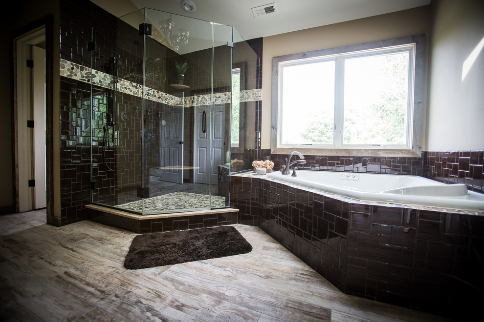 Inspiration for a huge rustic master brown tile and mosaic tile porcelain tile walk-in shower remodel in New York with an undermount sink, recessed-panel cabinets, gray cabinets, granite countertops, a hot tub, a one-piece toilet and beige walls