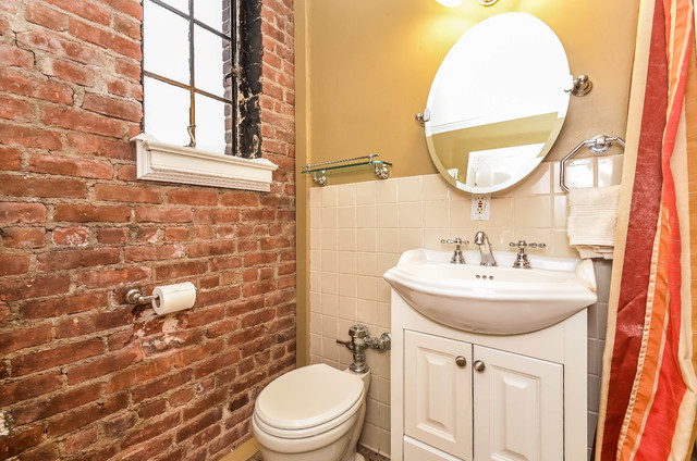 exposed brick in bathrooms